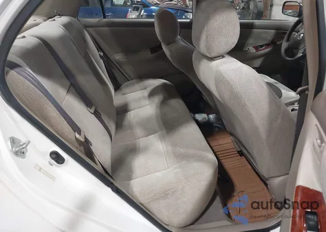 2003 Toyota Corolla Le z USA, uszkodzony, nr VIN JTDBR32E330020921